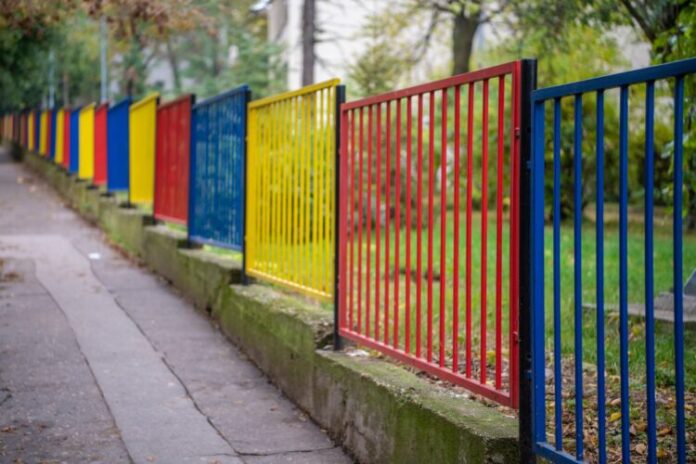 Decorative,Multicolor,Metal,Fence,At,School,Or,Kindergarten,Playground.