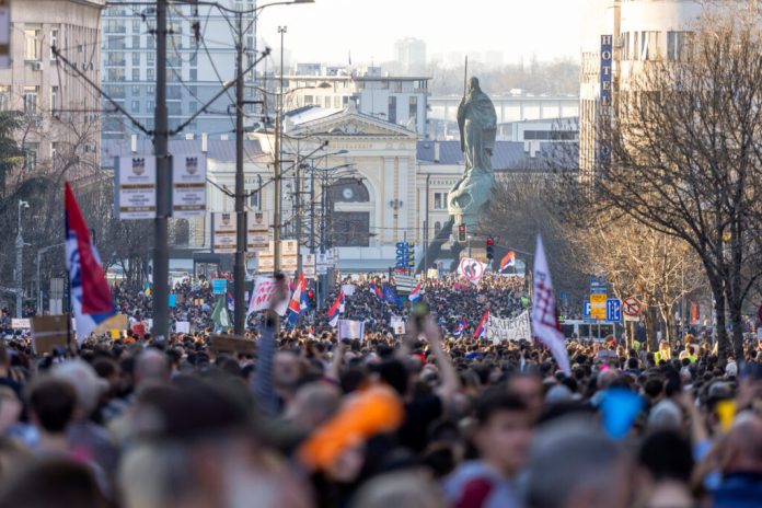 People demonstrate in support of a general strike, in Belgrade